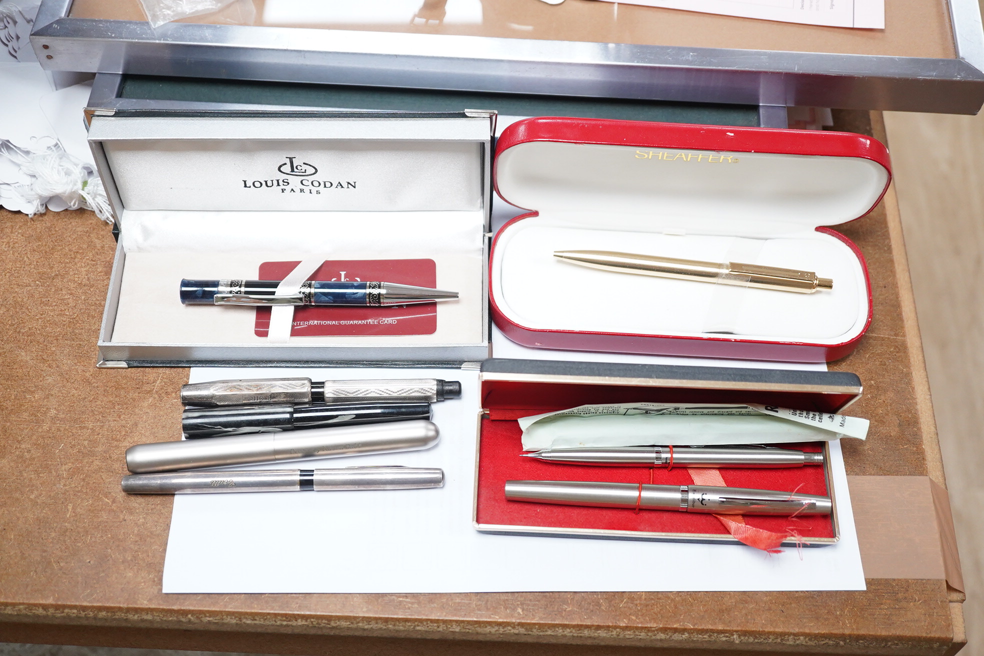 A quantity of pens including a silver fountain pen (8). Condition - fair